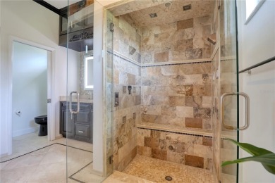 This home is a true SHOWSTOPPER, blending timeless elegance with on Westchase Golf Club in Florida - for sale on GolfHomes.com, golf home, golf lot