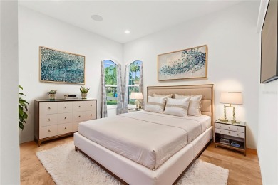 This home is a true SHOWSTOPPER, blending timeless elegance with on Westchase Golf Club in Florida - for sale on GolfHomes.com, golf home, golf lot