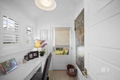 This gold fortified white painted concrete board home in the on Lakewood Golf Club in Alabama - for sale on GolfHomes.com, golf home, golf lot