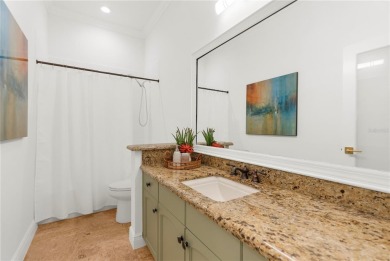 This home is a true SHOWSTOPPER, blending timeless elegance with on Westchase Golf Club in Florida - for sale on GolfHomes.com, golf home, golf lot