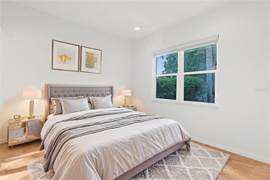 This home is a true SHOWSTOPPER, blending timeless elegance with on Westchase Golf Club in Florida - for sale on GolfHomes.com, golf home, golf lot