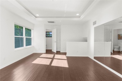 This home is a true SHOWSTOPPER, blending timeless elegance with on Westchase Golf Club in Florida - for sale on GolfHomes.com, golf home, golf lot