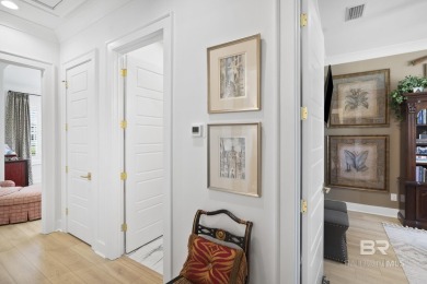 This gold fortified white painted concrete board home in the on Lakewood Golf Club in Alabama - for sale on GolfHomes.com, golf home, golf lot