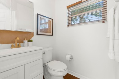 This home is a true SHOWSTOPPER, blending timeless elegance with on Westchase Golf Club in Florida - for sale on GolfHomes.com, golf home, golf lot