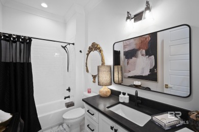 This gold fortified white painted concrete board home in the on Lakewood Golf Club in Alabama - for sale on GolfHomes.com, golf home, golf lot