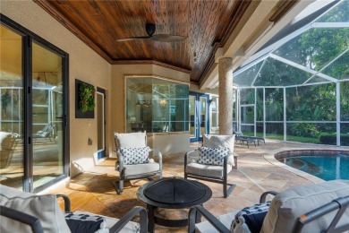 This home is a true SHOWSTOPPER, blending timeless elegance with on Westchase Golf Club in Florida - for sale on GolfHomes.com, golf home, golf lot