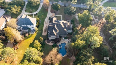 Tucked along the Rock Creek Golf Course in Fairhope, this on Rock Creek Golf Club in Alabama - for sale on GolfHomes.com, golf home, golf lot