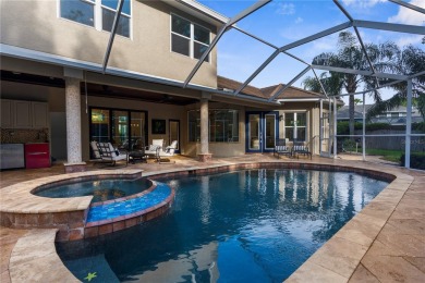 This home is a true SHOWSTOPPER, blending timeless elegance with on Westchase Golf Club in Florida - for sale on GolfHomes.com, golf home, golf lot