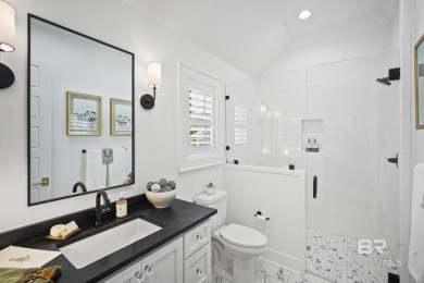 This gold fortified white painted concrete board home in the on Lakewood Golf Club in Alabama - for sale on GolfHomes.com, golf home, golf lot