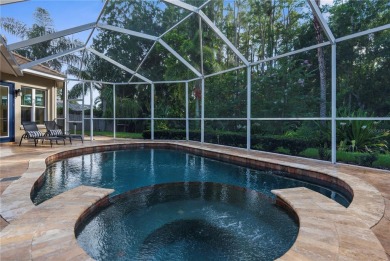 This home is a true SHOWSTOPPER, blending timeless elegance with on Westchase Golf Club in Florida - for sale on GolfHomes.com, golf home, golf lot