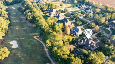 Tucked along the Rock Creek Golf Course in Fairhope, this on Rock Creek Golf Club in Alabama - for sale on GolfHomes.com, golf home, golf lot