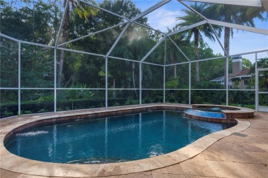 This home is a true SHOWSTOPPER, blending timeless elegance with on Westchase Golf Club in Florida - for sale on GolfHomes.com, golf home, golf lot
