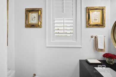 This gold fortified white painted concrete board home in the on Lakewood Golf Club in Alabama - for sale on GolfHomes.com, golf home, golf lot