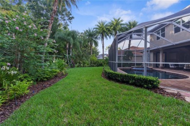 This home is a true SHOWSTOPPER, blending timeless elegance with on Westchase Golf Club in Florida - for sale on GolfHomes.com, golf home, golf lot