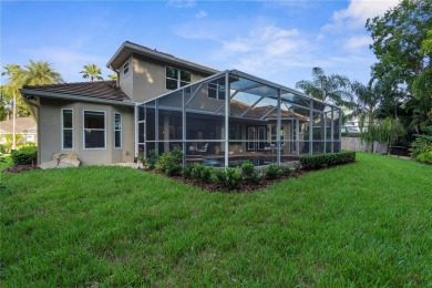 This home is a true SHOWSTOPPER, blending timeless elegance with on Westchase Golf Club in Florida - for sale on GolfHomes.com, golf home, golf lot