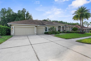 This home is a true SHOWSTOPPER, blending timeless elegance with on Westchase Golf Club in Florida - for sale on GolfHomes.com, golf home, golf lot