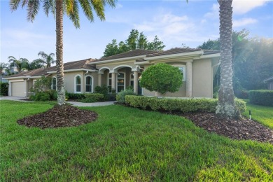 This home is a true SHOWSTOPPER, blending timeless elegance with on Westchase Golf Club in Florida - for sale on GolfHomes.com, golf home, golf lot