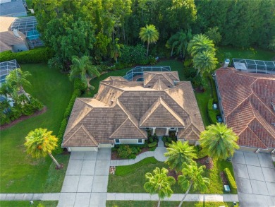 This home is a true SHOWSTOPPER, blending timeless elegance with on Westchase Golf Club in Florida - for sale on GolfHomes.com, golf home, golf lot