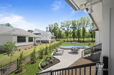 This gold fortified white painted concrete board home in the on Lakewood Golf Club in Alabama - for sale on GolfHomes.com, golf home, golf lot
