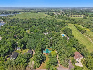 Welcome to your private retreat on the greens of Portage Country on Portage Country Club in Wisconsin - for sale on GolfHomes.com, golf home, golf lot
