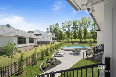 This gold fortified white painted concrete board home in the on Lakewood Golf Club in Alabama - for sale on GolfHomes.com, golf home, golf lot