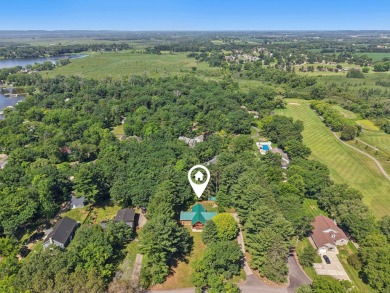 Welcome to your private retreat on the greens of Portage Country on Portage Country Club in Wisconsin - for sale on GolfHomes.com, golf home, golf lot