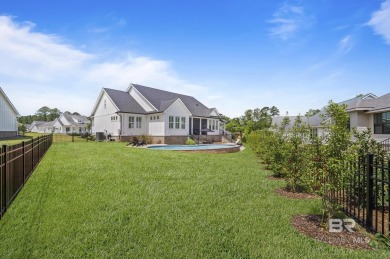 This gold fortified white painted concrete board home in the on Lakewood Golf Club in Alabama - for sale on GolfHomes.com, golf home, golf lot