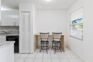 Turn-Key 2/2 Condo in Century Village - where life is anything on Flamingo Lakes Country Club in Florida - for sale on GolfHomes.com, golf home, golf lot