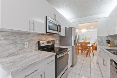 Turn-Key 2/2 Condo in Century Village - where life is anything on Flamingo Lakes Country Club in Florida - for sale on GolfHomes.com, golf home, golf lot