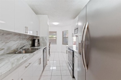 Turn-Key 2/2 Condo in Century Village - where life is anything on Flamingo Lakes Country Club in Florida - for sale on GolfHomes.com, golf home, golf lot