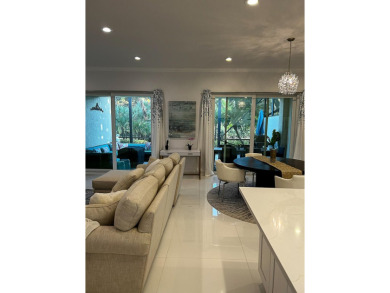 Beautifully renovated and filled with natural light, this bright on Ibis Golf and Country Club in Florida - for sale on GolfHomes.com, golf home, golf lot
