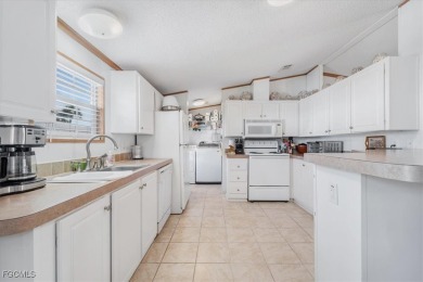 WATERFRONT LIVING AT ITS BEST - LAND OWNERSHIP! NO LOT RENT! on Live Oak Golf Club and RV Park in Florida - for sale on GolfHomes.com, golf home, golf lot