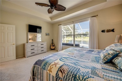 Welcome to this beautifully maintained lakefront home offering on Royal Tee Country Club in Florida - for sale on GolfHomes.com, golf home, golf lot