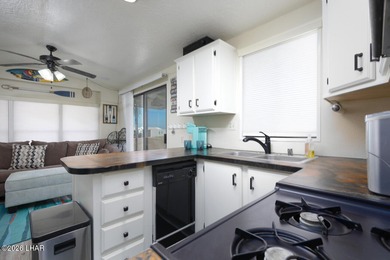 Located on Lease land. This desirable Park model unit offers on London Bridge Golf Course in Arizona - for sale on GolfHomes.com, golf home, golf lot