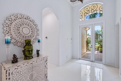 Beautifully renovated and filled with natural light, this bright on Ibis Golf and Country Club in Florida - for sale on GolfHomes.com, golf home, golf lot