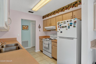 ***Motivated Seller*** Discover this end-unit 2-bedroom, 2-bath on The Club At Pelican Bay - North Course in Florida - for sale on GolfHomes.com, golf home, golf lot