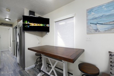 Located on Lease land. This desirable Park model unit offers on London Bridge Golf Course in Arizona - for sale on GolfHomes.com, golf home, golf lot