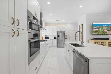 Beautifully renovated and filled with natural light, this bright on Ibis Golf and Country Club in Florida - for sale on GolfHomes.com, golf home, golf lot