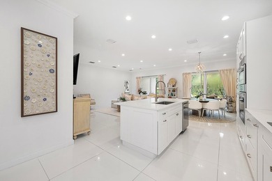 Beautifully renovated and filled with natural light, this bright on Ibis Golf and Country Club in Florida - for sale on GolfHomes.com, golf home, golf lot