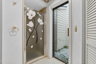 ***Motivated Seller*** Discover this end-unit 2-bedroom, 2-bath on The Club At Pelican Bay - North Course in Florida - for sale on GolfHomes.com, golf home, golf lot