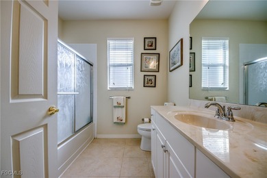 Welcome to this beautifully maintained lakefront home offering on Royal Tee Country Club in Florida - for sale on GolfHomes.com, golf home, golf lot