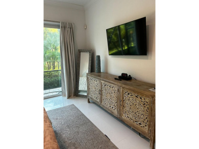 Beautifully renovated and filled with natural light, this bright on Ibis Golf and Country Club in Florida - for sale on GolfHomes.com, golf home, golf lot