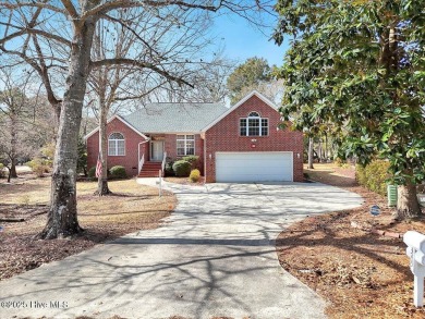 Charming brick home located in the gated community of Lockwood on Lockwood Folly Country Club in North Carolina - for sale on GolfHomes.com, golf home, golf lot