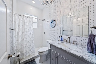 Beautifully renovated and filled with natural light, this bright on Ibis Golf and Country Club in Florida - for sale on GolfHomes.com, golf home, golf lot