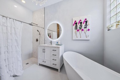Beautifully renovated and filled with natural light, this bright on Ibis Golf and Country Club in Florida - for sale on GolfHomes.com, golf home, golf lot