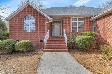 Charming brick home located in the gated community of Lockwood on Lockwood Folly Country Club in North Carolina - for sale on GolfHomes.com, golf home, golf lot