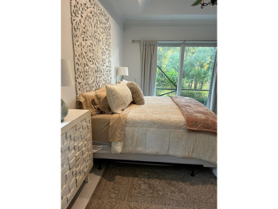 Beautifully renovated and filled with natural light, this bright on Ibis Golf and Country Club in Florida - for sale on GolfHomes.com, golf home, golf lot