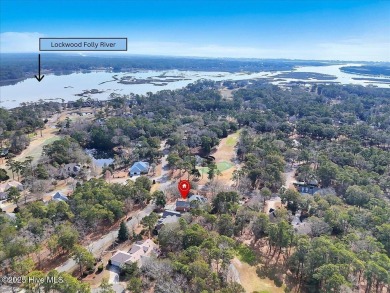 Charming brick home located in the gated community of Lockwood on Lockwood Folly Country Club in North Carolina - for sale on GolfHomes.com, golf home, golf lot