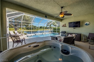 Welcome to this beautifully maintained lakefront home offering on Royal Tee Country Club in Florida - for sale on GolfHomes.com, golf home, golf lot