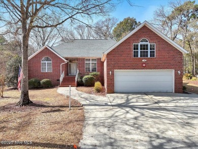 Charming brick home located in the gated community of Lockwood on Lockwood Folly Country Club in North Carolina - for sale on GolfHomes.com, golf home, golf lot